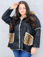 Ciepła kurtka plus size z kapturem w zwierzęcy wzór – styl i wygoda w jednym Stylowa XL