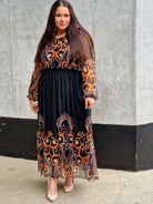 Długa sukienka plus size – elegancka, kobieca i pełna klasy propozycja Stylowa XL