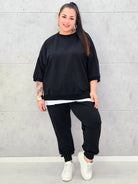 Dres plus size czarny – komfortowy komplet XXL dla kobiet ceniących styl i wygodę Stylowa XL