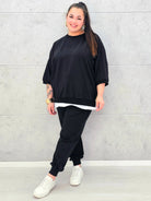 Dres plus size czarny – komfortowy komplet XXL dla kobiet ceniących styl i wygodę Stylowa XL