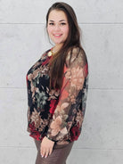 Elegancka bluzka plus size w kwiaty – kobiecy szyk i wygoda w jednym Stylowa XL