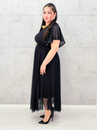 Elegancka sukienka XXL z cekinową górą i plisowanym dołem – wyjątkowa kolekcja plus size Stylowa XL