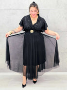 Elegancka sukienka XXL z cekinową górą i plisowanym dołem – wyjątkowa kolekcja plus size Stylowa XL