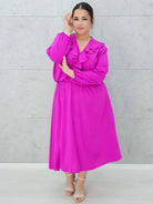 Elegancka sukienka z żabotem  w kolorach Stylowa XL