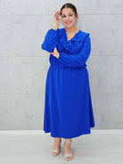 Elegancka sukienka z żabotem  w kolorach Stylowa XL