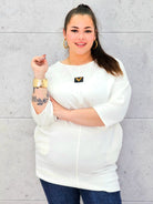 Elegancka tunika plus size w kolorze ecru – stylowa i wygodna propozycja dla kobiet XXL Stylowa XL