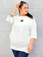 Elegancka tunika plus size w kolorze ecru – stylowa i wygodna propozycja dla kobiet XXL Stylowa XL