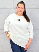 Elegancka tunika plus size w kolorze ecru – stylowa i wygodna propozycja dla kobiet XXL Stylowa XL