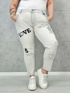 Jeansy plus size w szarym denimie – modne spodnie XXL dla kobiet Stylowa XL