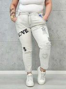 Jeansy plus size w szarym denimie – modne spodnie XXL dla kobiet Stylowa XL