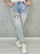 Jeansy plus size z aplikacją misia – jasny denim XXL z urocznym akcentem Stylowa XL