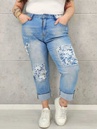 Jeansy plus size z koronkowymi wstawkami – kobiecy denim XXL na co dzień Stylowa XL