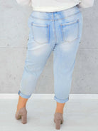 Jeansy plus size z naszywkami moro i cekinami – modne i wygodne Stylowa XL Stylowa XL