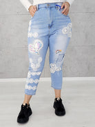 Jeansy z koronkowymi aplikacjami i sercem z cekinów Stylowa XL