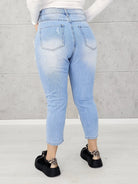 Jeansy z koronkowymi aplikacjami i sercem z cekinów Stylowa XL