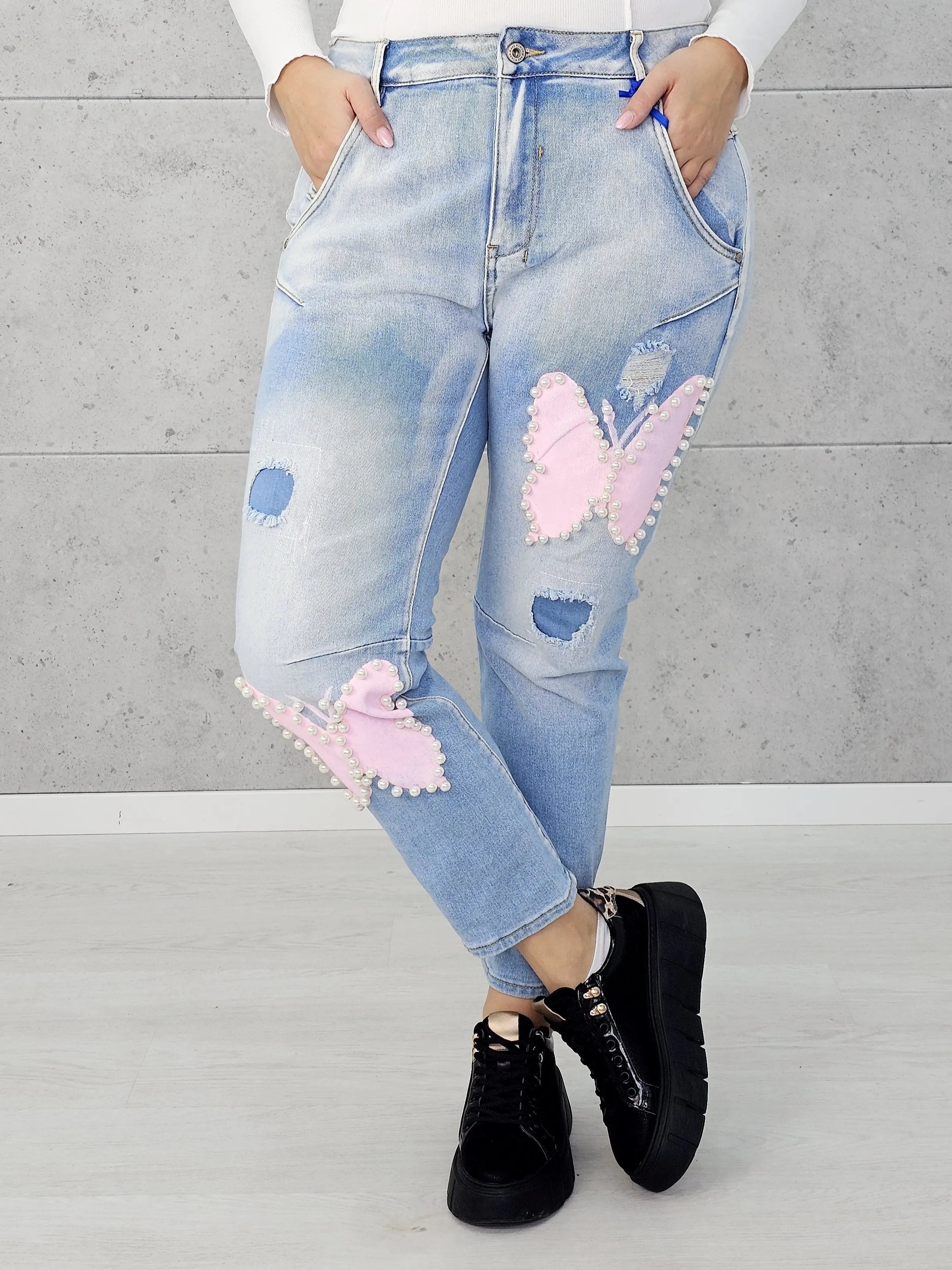 Jeansy z różowymi motylami i perełkami Stylowa XL