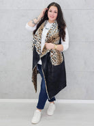 Kamizelka plus size z futerkiem w zwierzęcy wzór – modny akcent i ciepło w jednym Stylowa XL