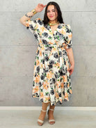 Kobieca sukienka plus size w kwiaty róży z kopertowym dekoltem- trzy kolory Stylowa XL