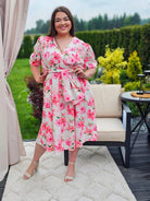 Kobieca sukienka w kwiaty róży z kopertowym dekoltem- trzy kolory Stylowa XL