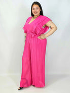 Kombinezon plus size VIP z plisowanymi nogawkami i efektownym dekoltem Stylowa XL