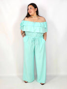 Kombinezon plus size –elegancki kombinezon z odkrytymi ramionami i szerokimi nogawkami Stylowa XL