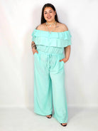 Kombinezon plus size –elegancki kombinezon z odkrytymi ramionami i szerokimi nogawkami Stylowa XL