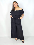 Kombinezon plus size –elegancki kombinezon z odkrytymi ramionami i szerokimi nogawkami Stylowa XL