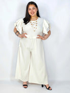 Kombinezon plus size z falbankami – elegancja i kobiecy styl XXL Stylowa XL