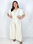Kombinezon plus size z falbankami – elegancja i kobiecy styl XXL Stylowa XL