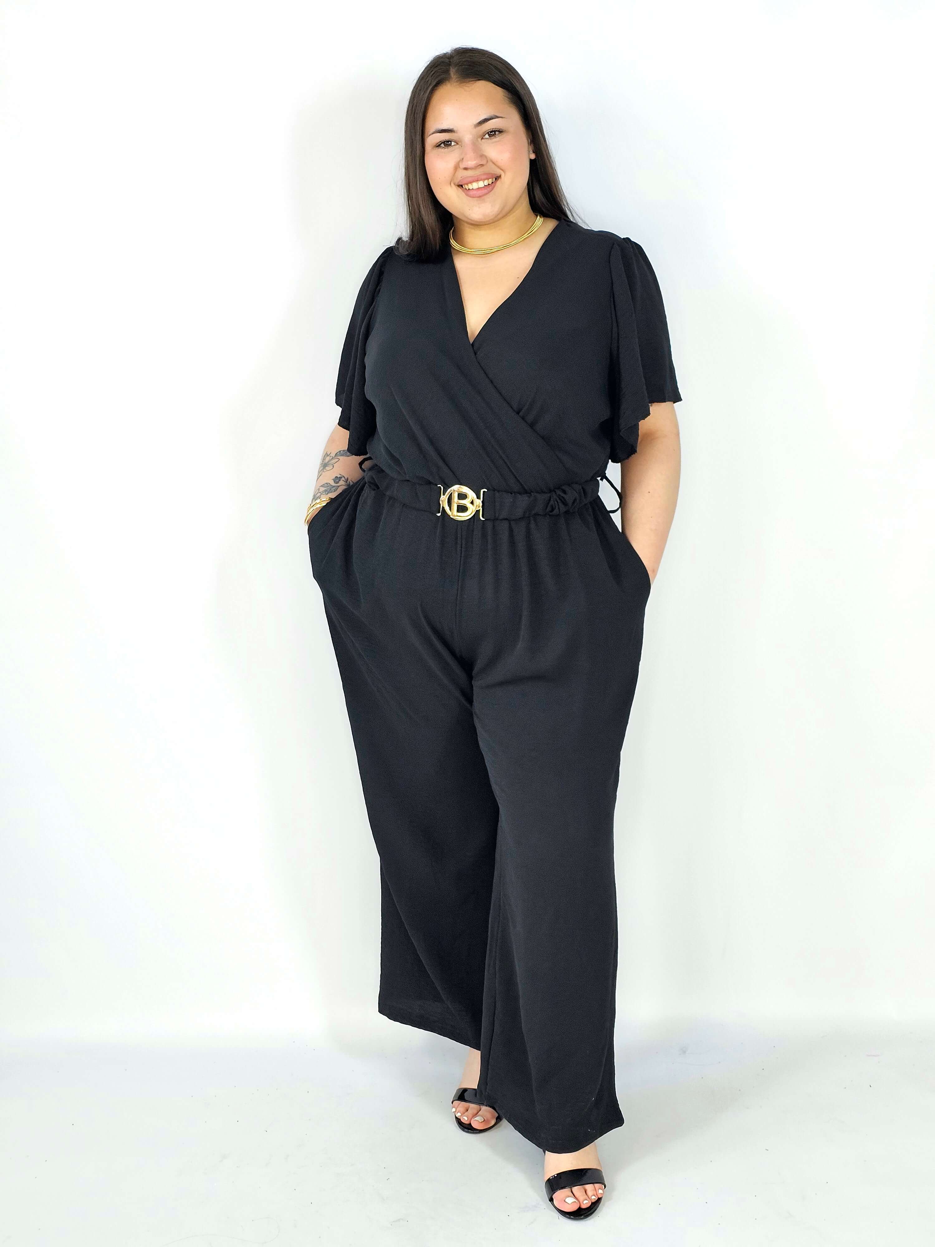 Kombinezon plus size z kopertowym dekoltem i paskiem – wygoda i styl XXL Stylowa XL