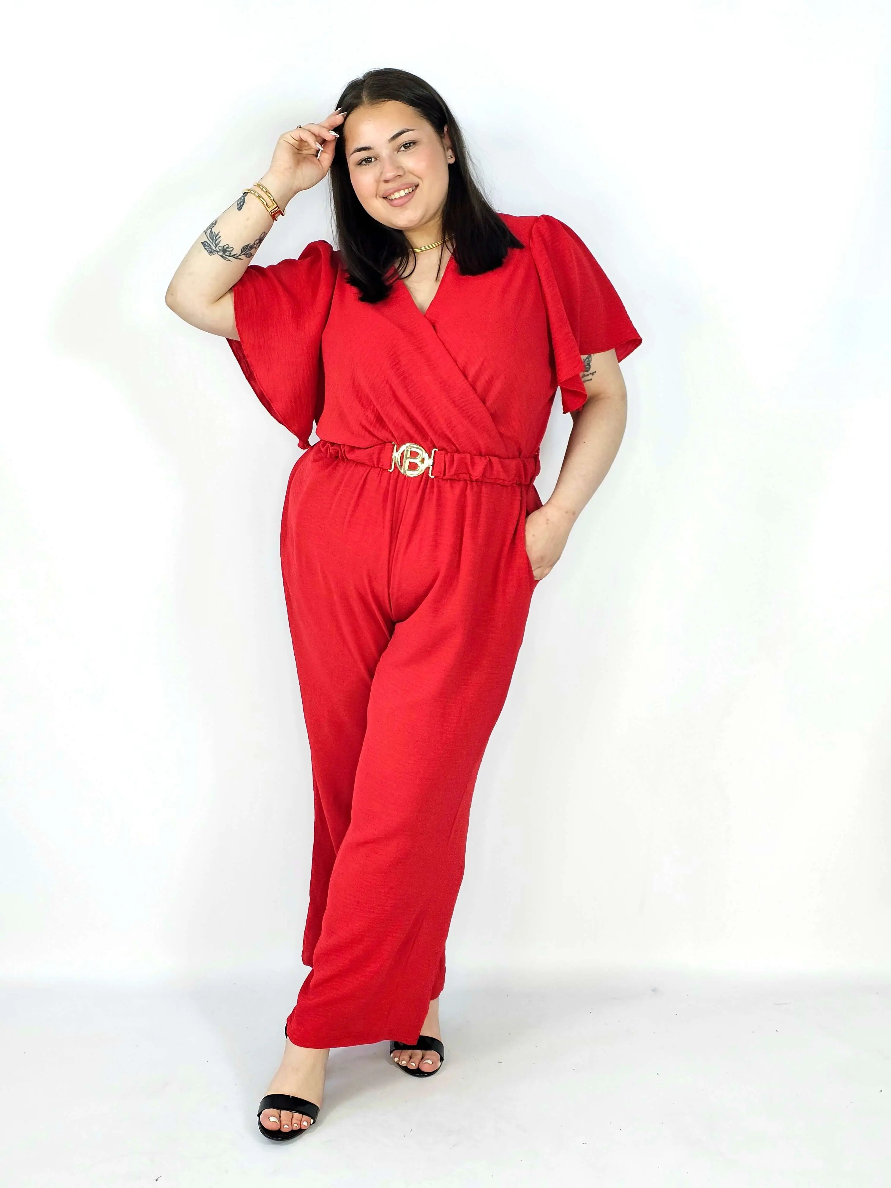 Kombinezon plus size z kopertowym dekoltem i paskiem – wygoda i styl XXL Stylowa XL