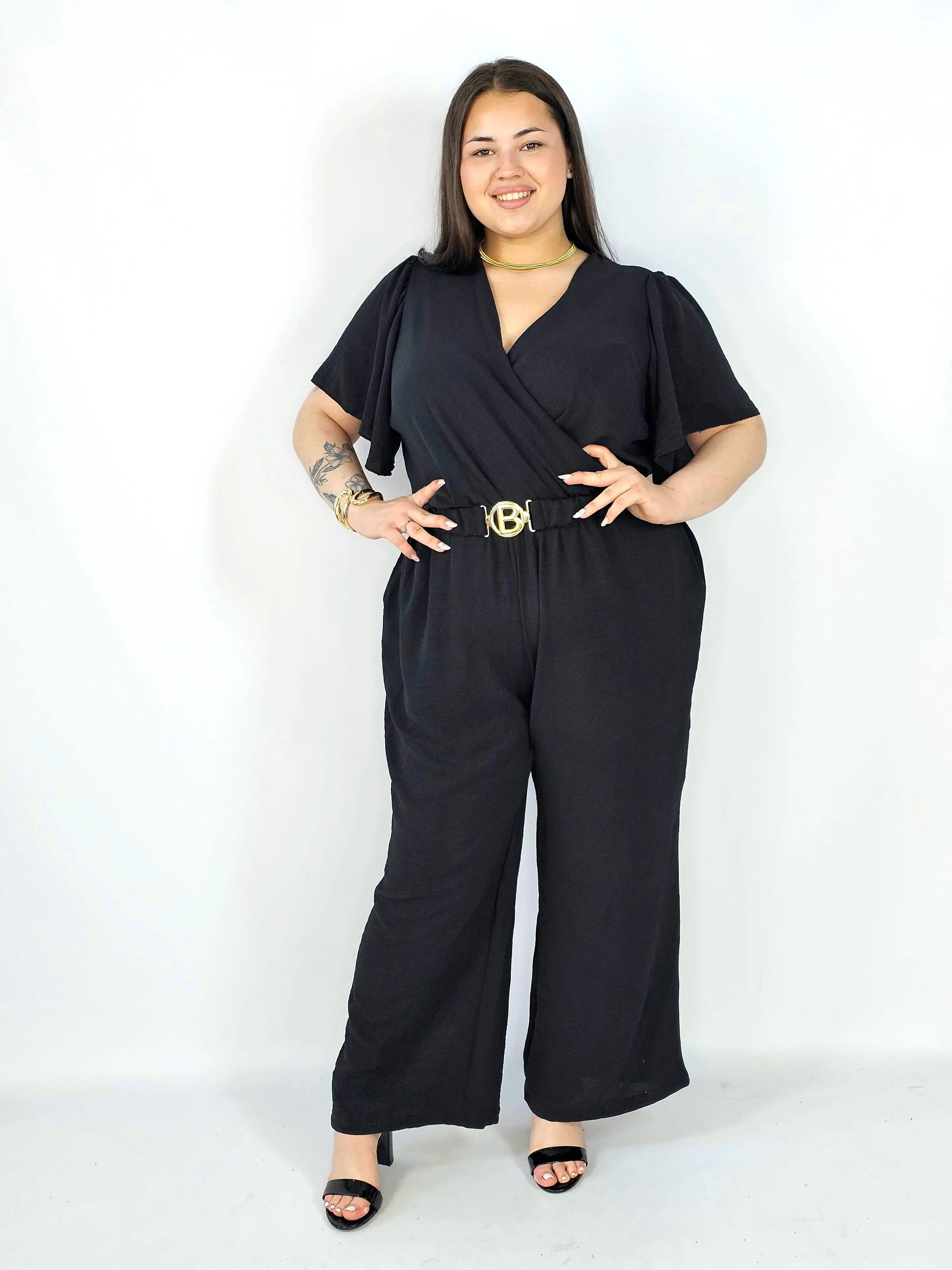 Kombinezon plus size z kopertowym dekoltem i paskiem – wygoda i styl XXL Stylowa XL