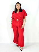 Kombinezon plus size z kopertowym dekoltem i paskiem – wygoda i styl XXL Stylowa XL