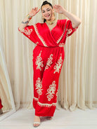 Kombinezon plus size z kopertowym dekoltem i szeroką nogawką – wyrazisty styl XXL Stylowa XL