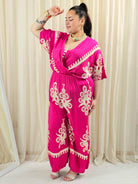Kombinezon plus size z kopertowym dekoltem i szeroką nogawką – wyrazisty styl XXL Stylowa XL
