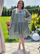 Koronkowa sukienka z falowanym dołem Stylowa XL