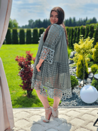 Koronkowa sukienka z falowanym dołem Stylowa XL