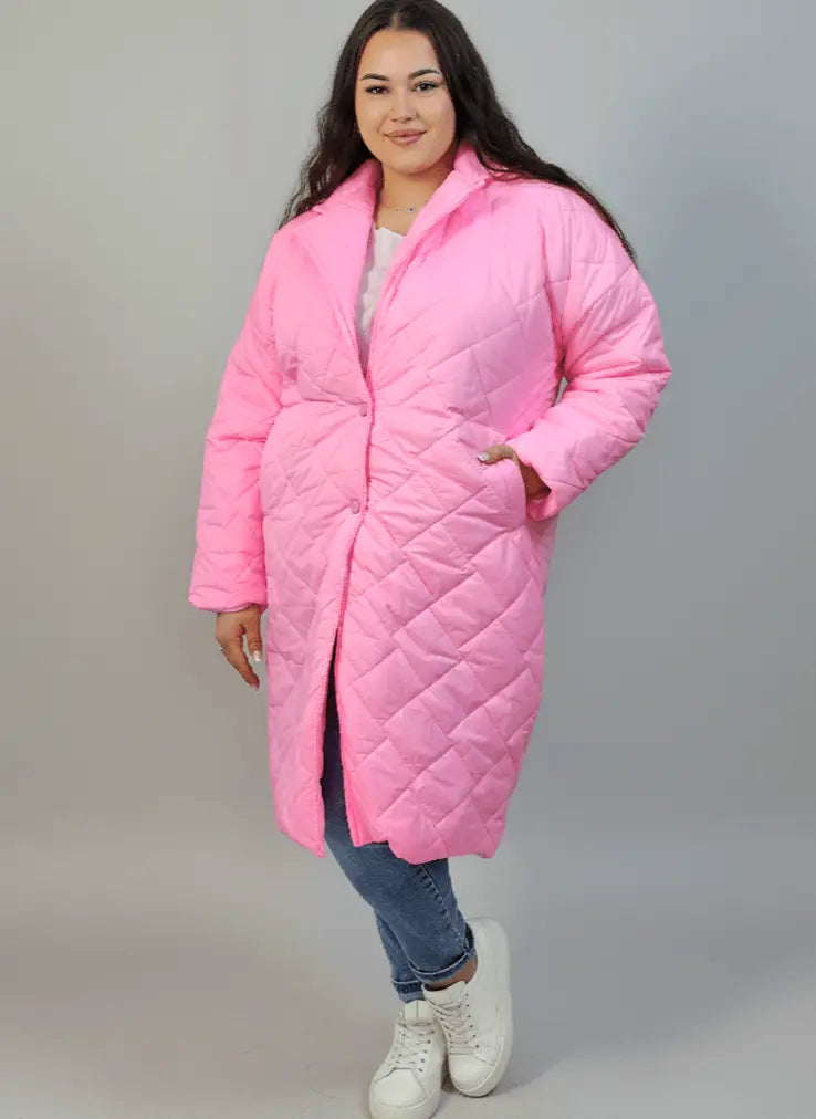 Kurtka plus size pikowana z dłuższym fasonem i kieszeniami Stylowa XL