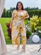 Letni kombinezon z kopertowym dekoltem Stylowa XL