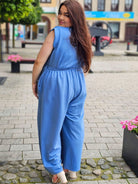 Letni kombinezon z kwiatową aplikacją Stylowa XL