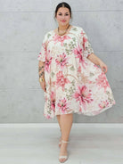 Letnia sukienka w kwiaty z plisowaniem. Stylowa XL