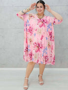 Letnia sukienka w kwiaty z plisowaniem. Stylowa XL