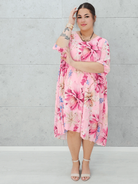 Letnia sukienka w kwiaty z plisowaniem. Stylowa XL