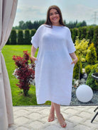 Lniana sukienka midi z wiązaniem Stylowa XL