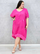 Lniana sukienka oversize midi z dekoltem V i kieszeniami Stylowa XL