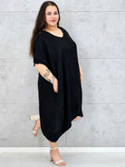 Lniana sukienka oversize midi z dekoltem V i kieszeniami Stylowa XL