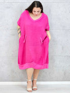 Lniana sukienka oversize midi z dekoltem V i kieszeniami Stylowa XL