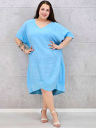 Lniana sukienka oversize midi z dekoltem V i kieszeniami Stylowa XL