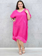 Lniana sukienka oversize midi z dekoltem V i kieszeniami Stylowa XL