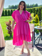 Piękna sukienka kopertowa z przodem krótszym Stylowa XL